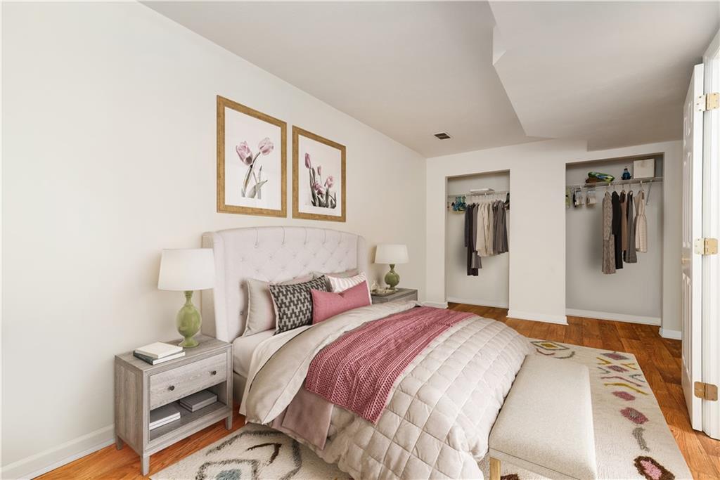 116 West Cruikshank Road Butler, PA 16002 - Photo 19 of 25 a bedroom with a bed and wooden floor