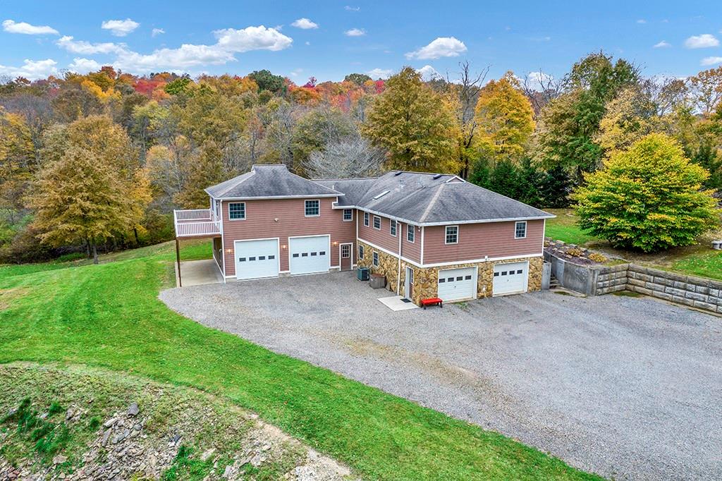 116 West Cruikshank Road Butler, PA 16002 - Photo 2 of 25 a view of a house with a yard and roof
