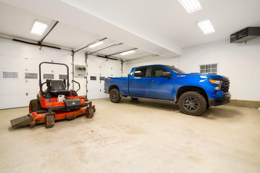 116 West Cruikshank Road Butler, PA 16002 - Photo 22 of 25 a car is parked in a garage