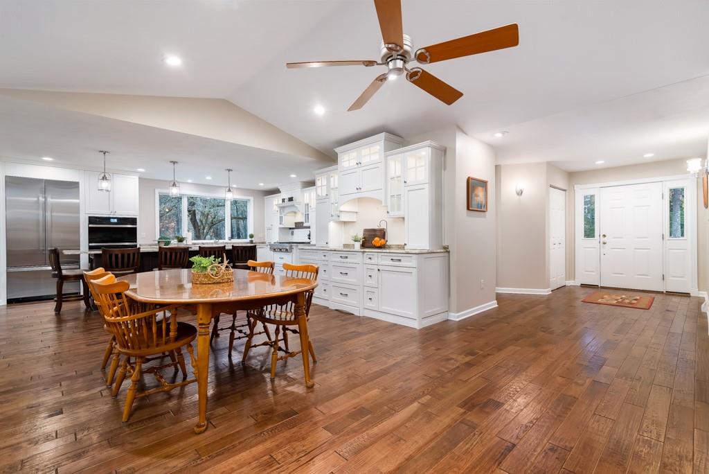 116 West Cruikshank Road Butler, PA 16002 - Photo 4 of 25 a kitchen with stainless steel appliances kitchen island granite countertop a table chairs and a refrigerator