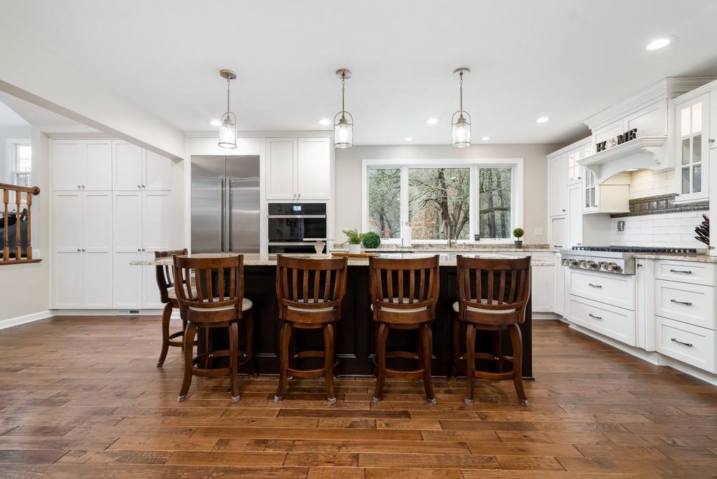 116 West Cruikshank Road Butler, PA 16002 - Photo 8 of 25 a large kitchen with a table and chairs