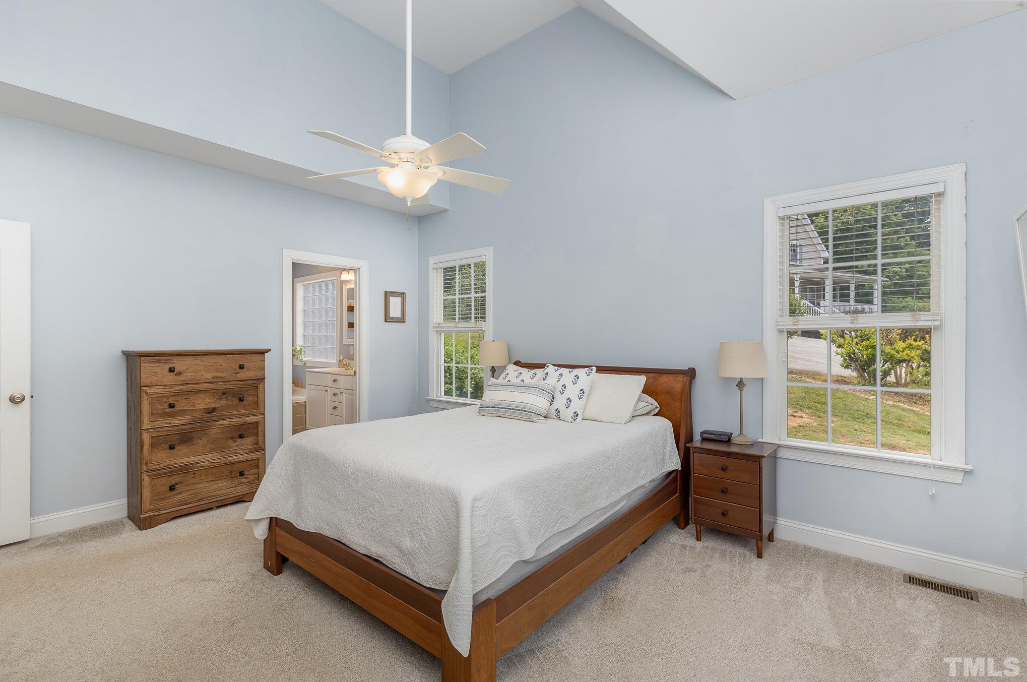 1308 Red Brick Road Garner, NC 27529 - Photo 13 of 31 a bedroom with a bed and a window