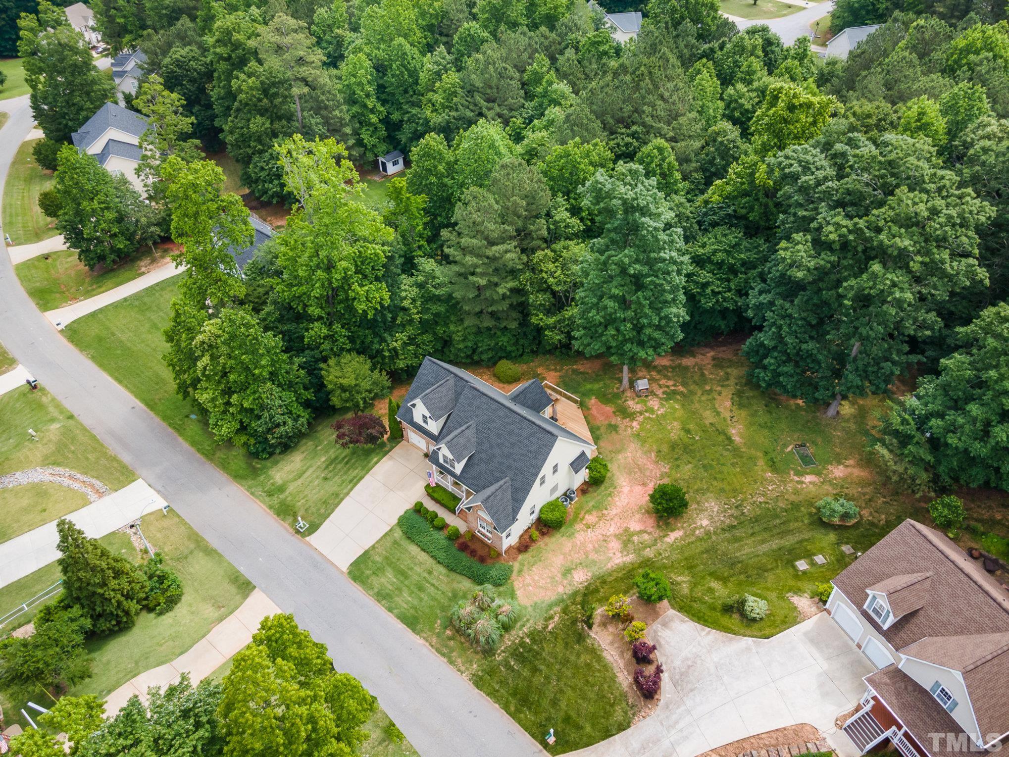 1308 Red Brick Road Garner, NC 27529 - Photo 26 of 31 an aerial view of a house with garden space and street view