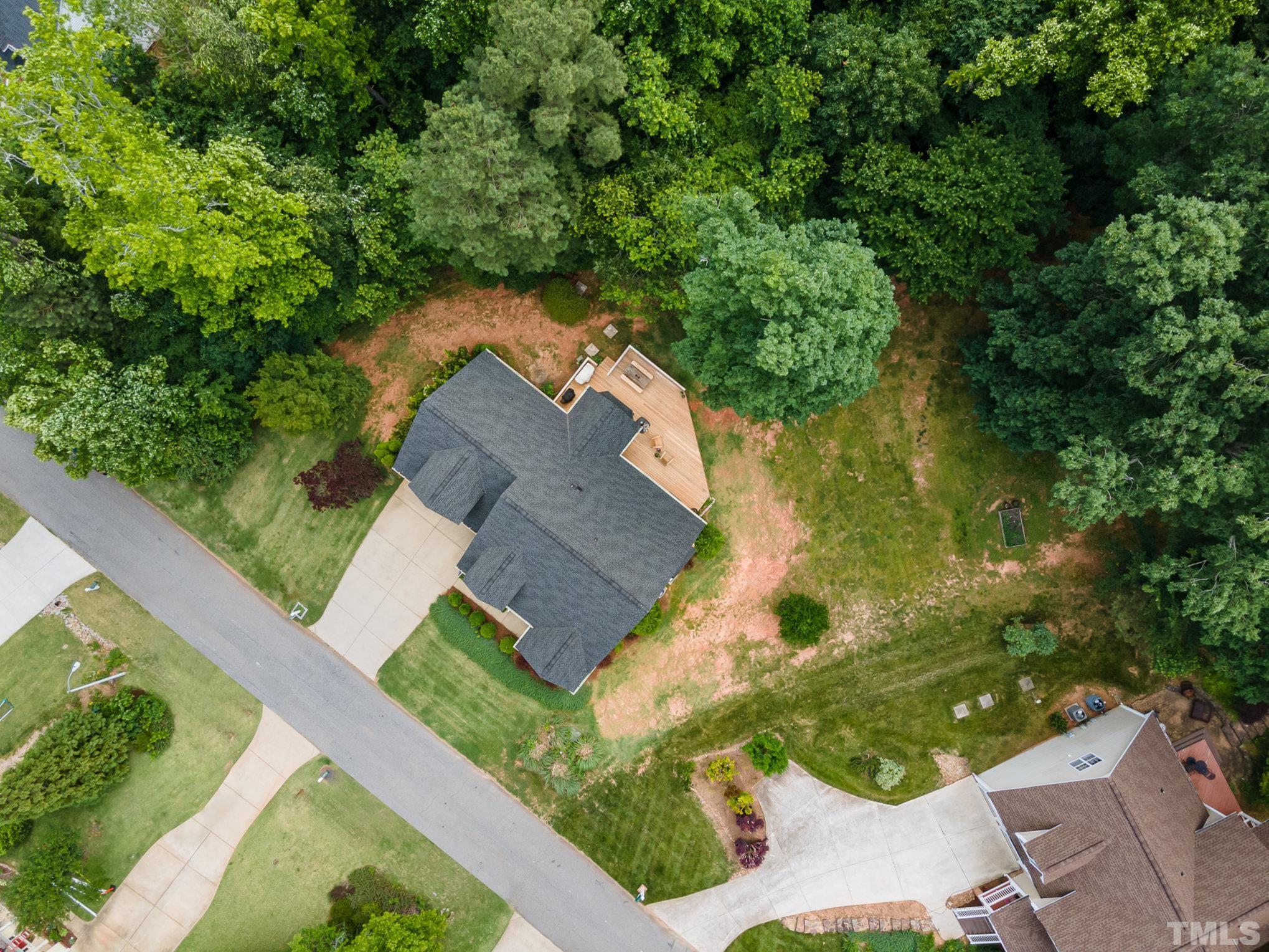 1308 Red Brick Road Garner, NC 27529 - Photo 27 of 31 an aerial view of a house with garden space and street view