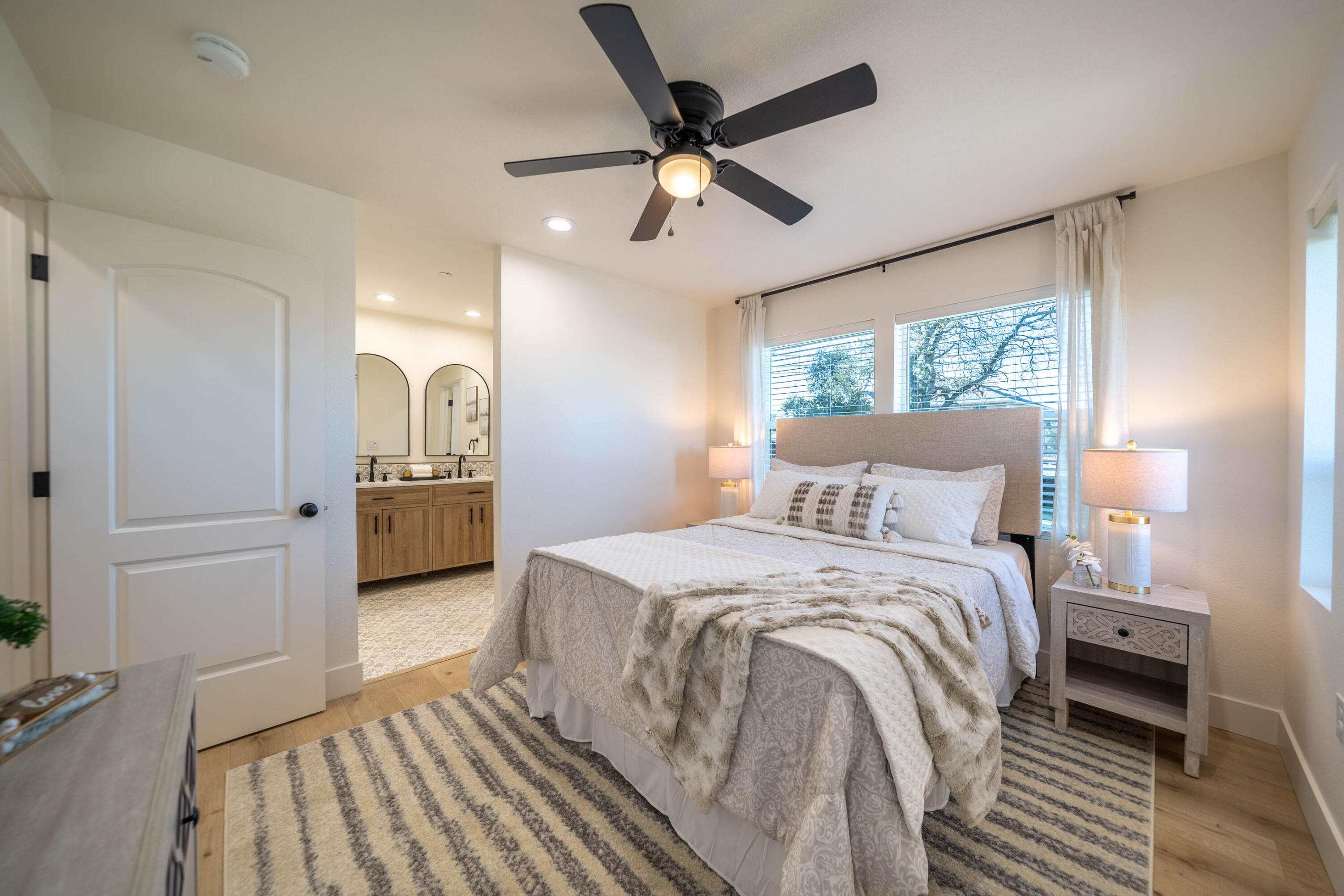 1387 Ridge Drive Redding, CA 96001 - Photo 18 of 44 a bedroom with a bed and a view of mirror