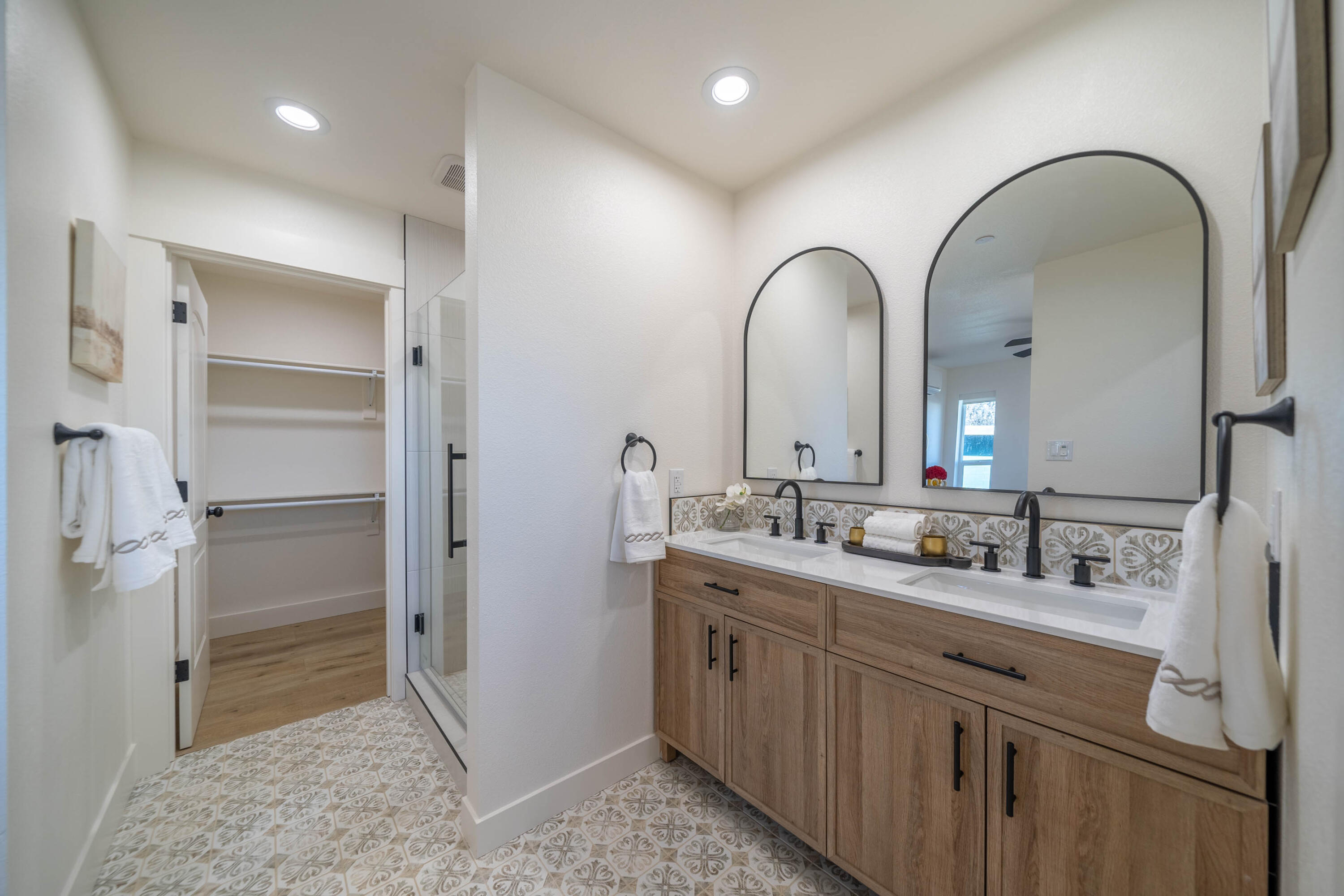1387 Ridge Drive Redding, CA 96001 - Photo 20 of 44 a bathroom with a double vanity sink and a mirror