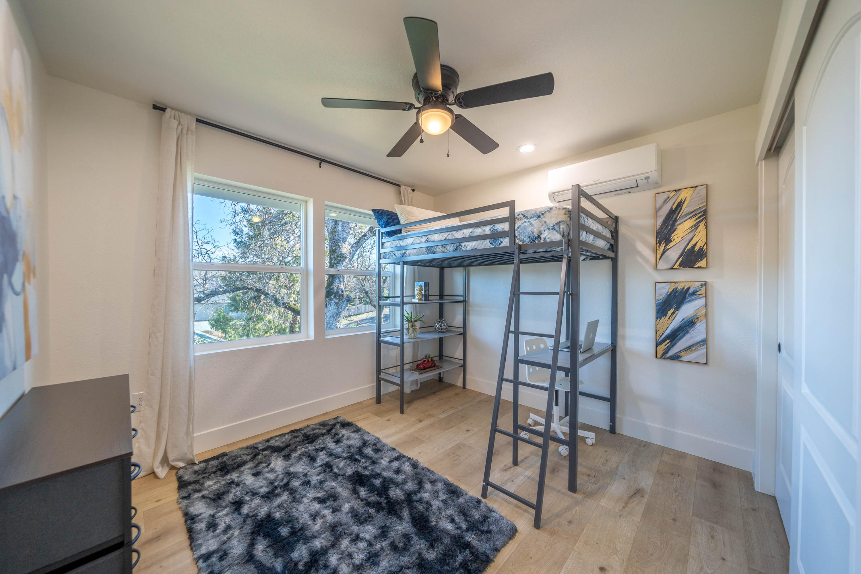 1387 Ridge Drive Redding, CA 96001 - Photo 22 of 44 a view of a livingroom with furniture and a ceiling fan