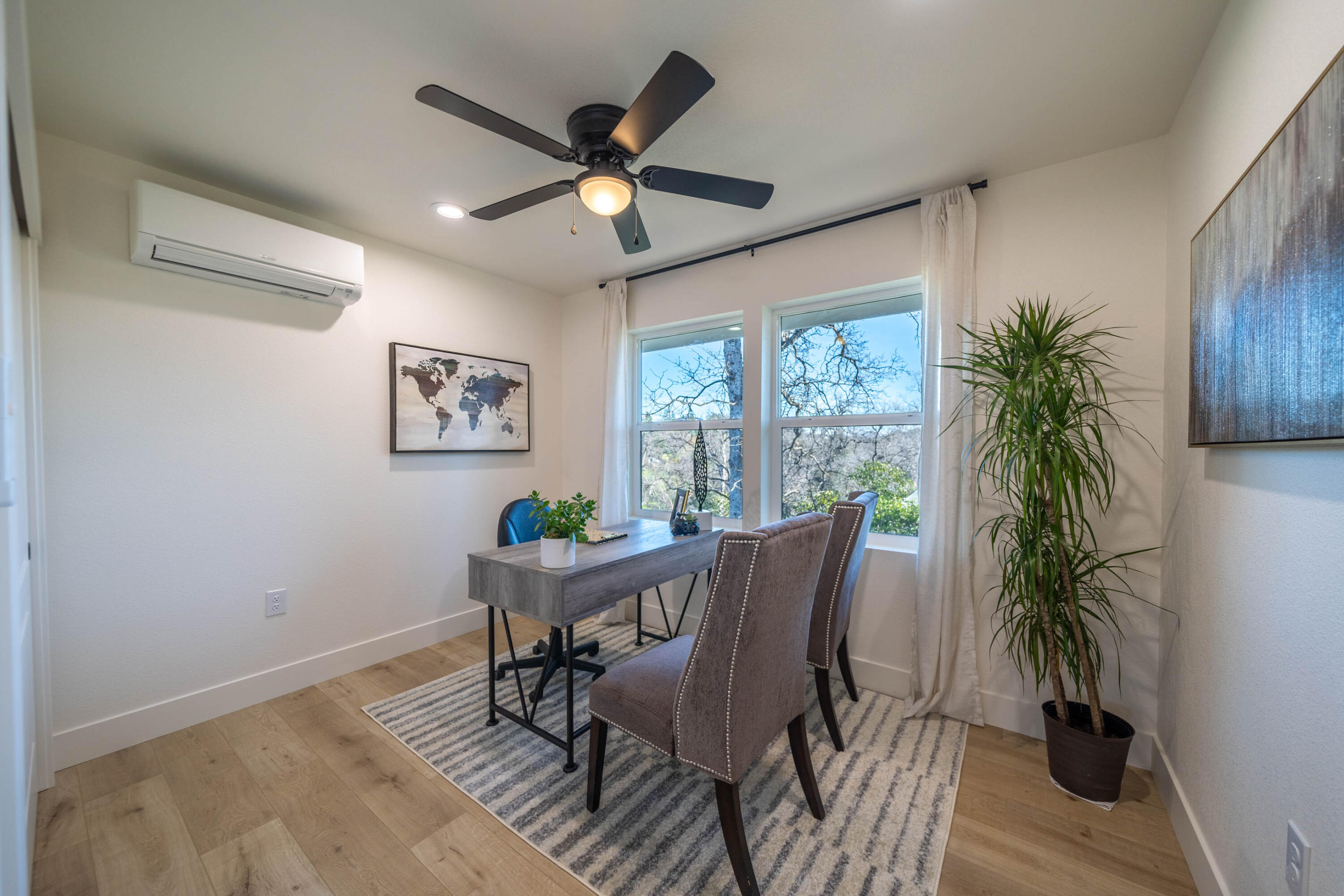 1387 Ridge Drive Redding, CA 96001 - Photo 26 of 44 a dining room with furniture window and wooden floor