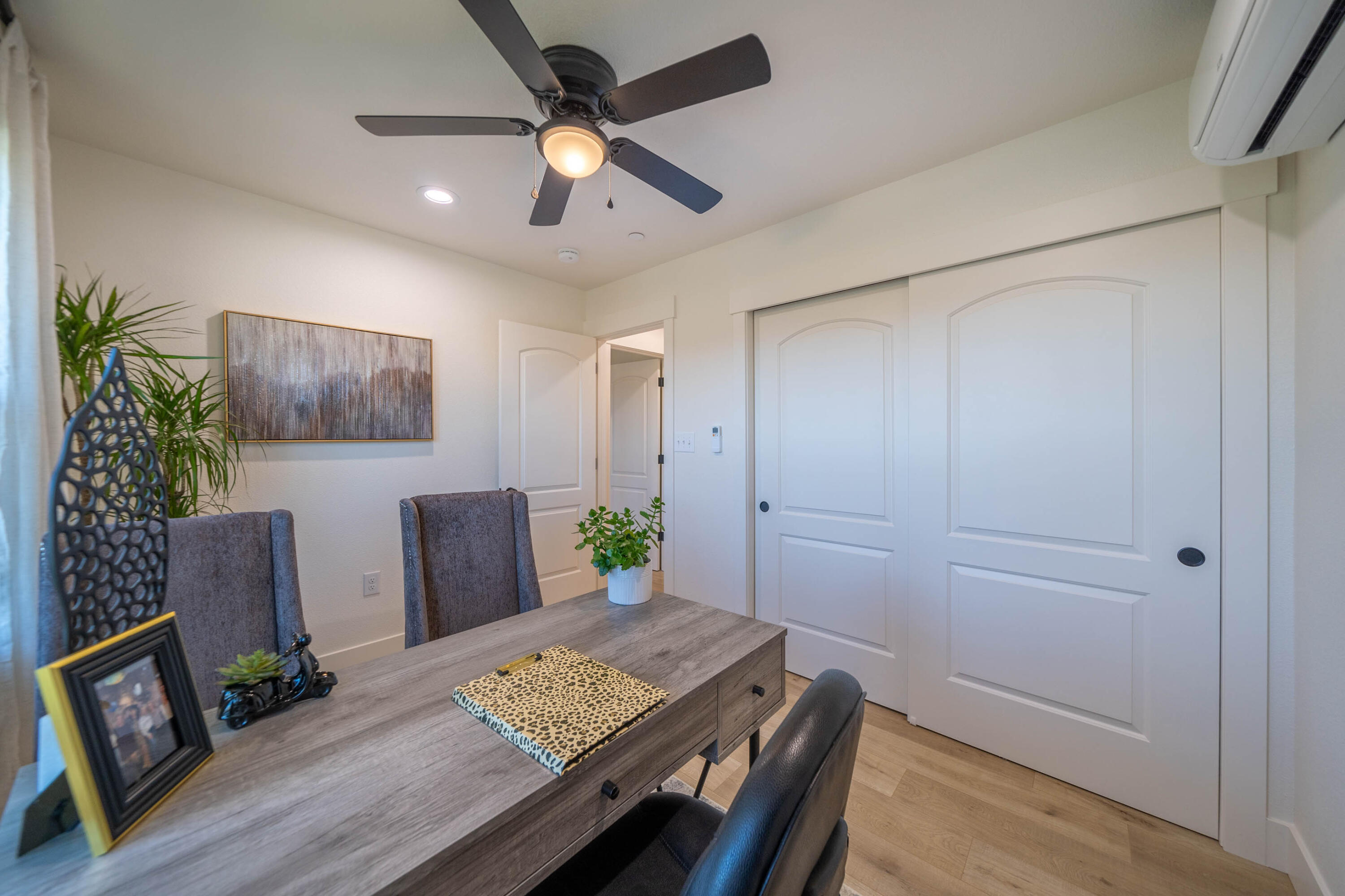 1387 Ridge Drive Redding, CA 96001 - Photo 27 of 44 a living room with furniture and a wooden floor