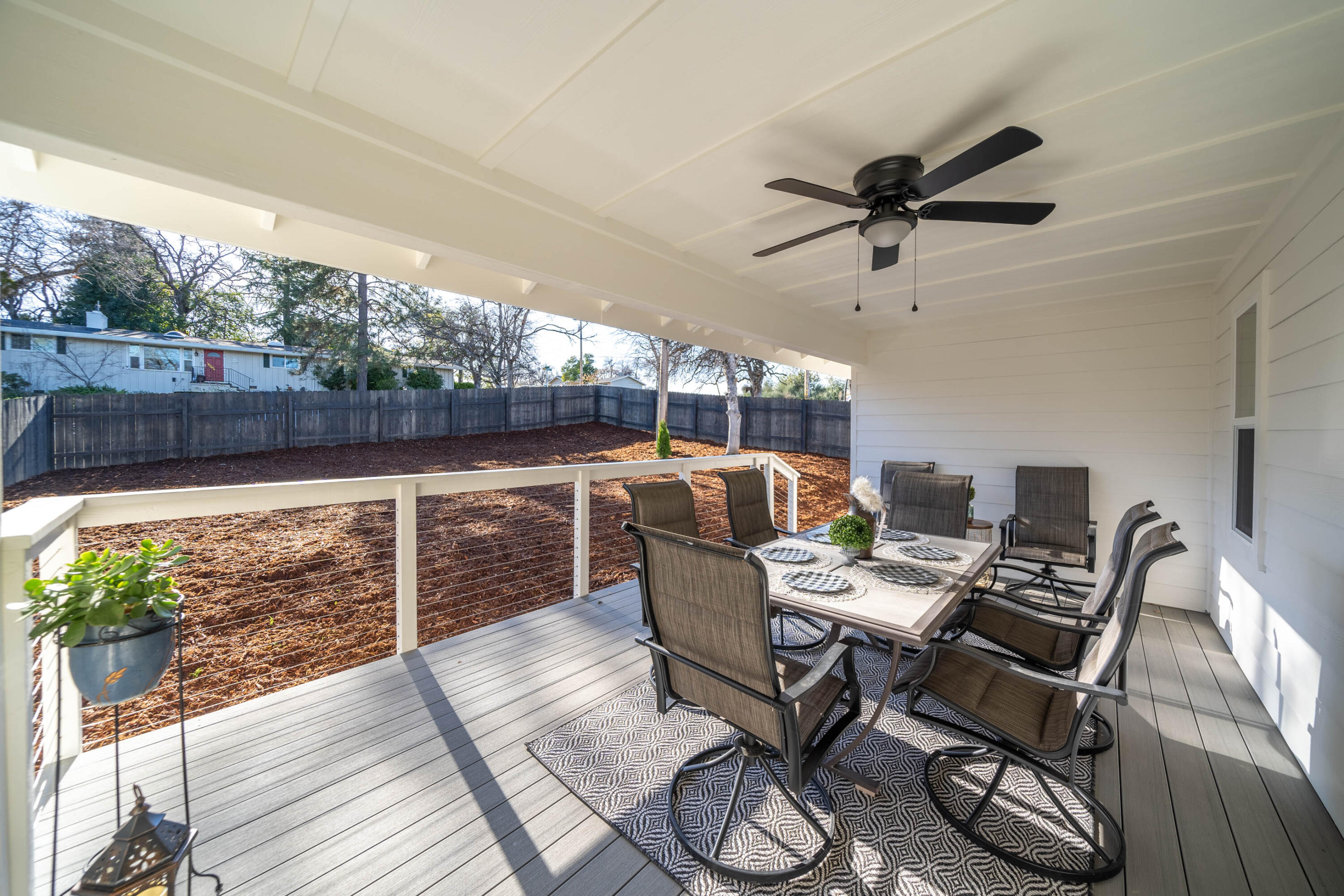 1387 Ridge Drive Redding, CA 96001 - Photo 31 of 44 a dining room with furniture and a floor to ceiling window