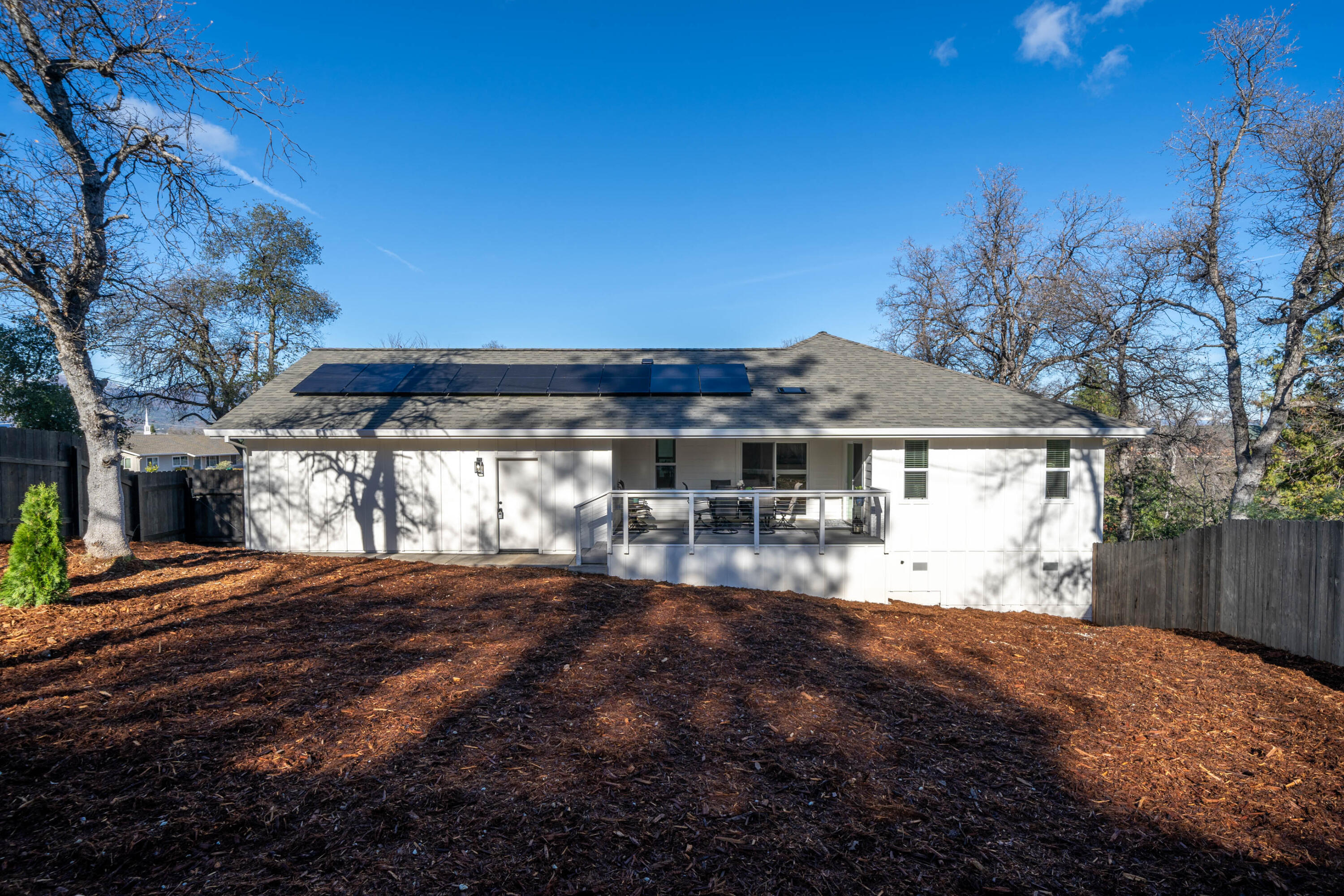 1387 Ridge Drive Redding, CA 96001 - Photo 34 of 44 a view of a house with backyard and sitting area