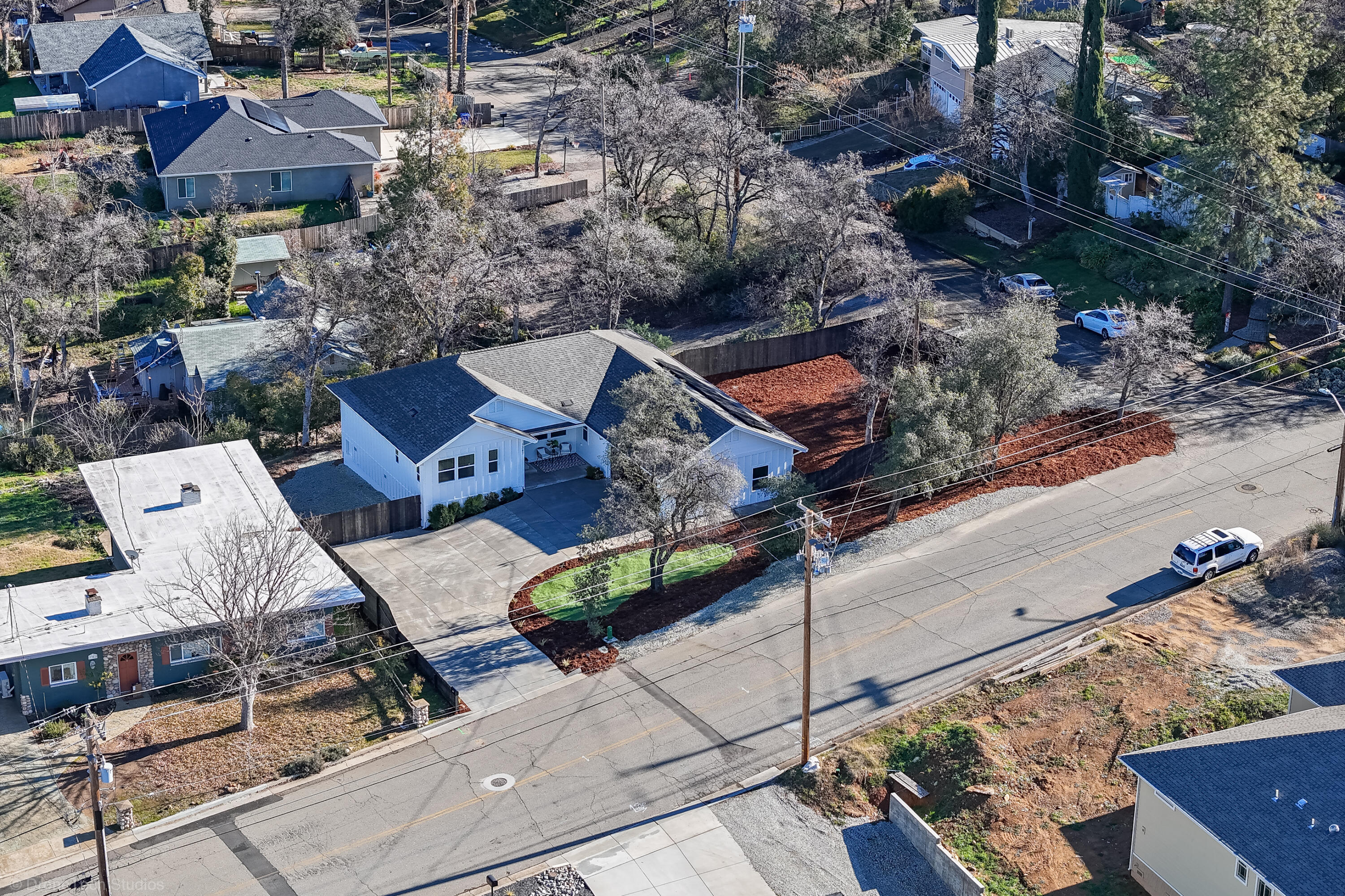1387 Ridge Drive Redding, CA 96001 - Photo 39 of 44 an aerial view of a house with a garden