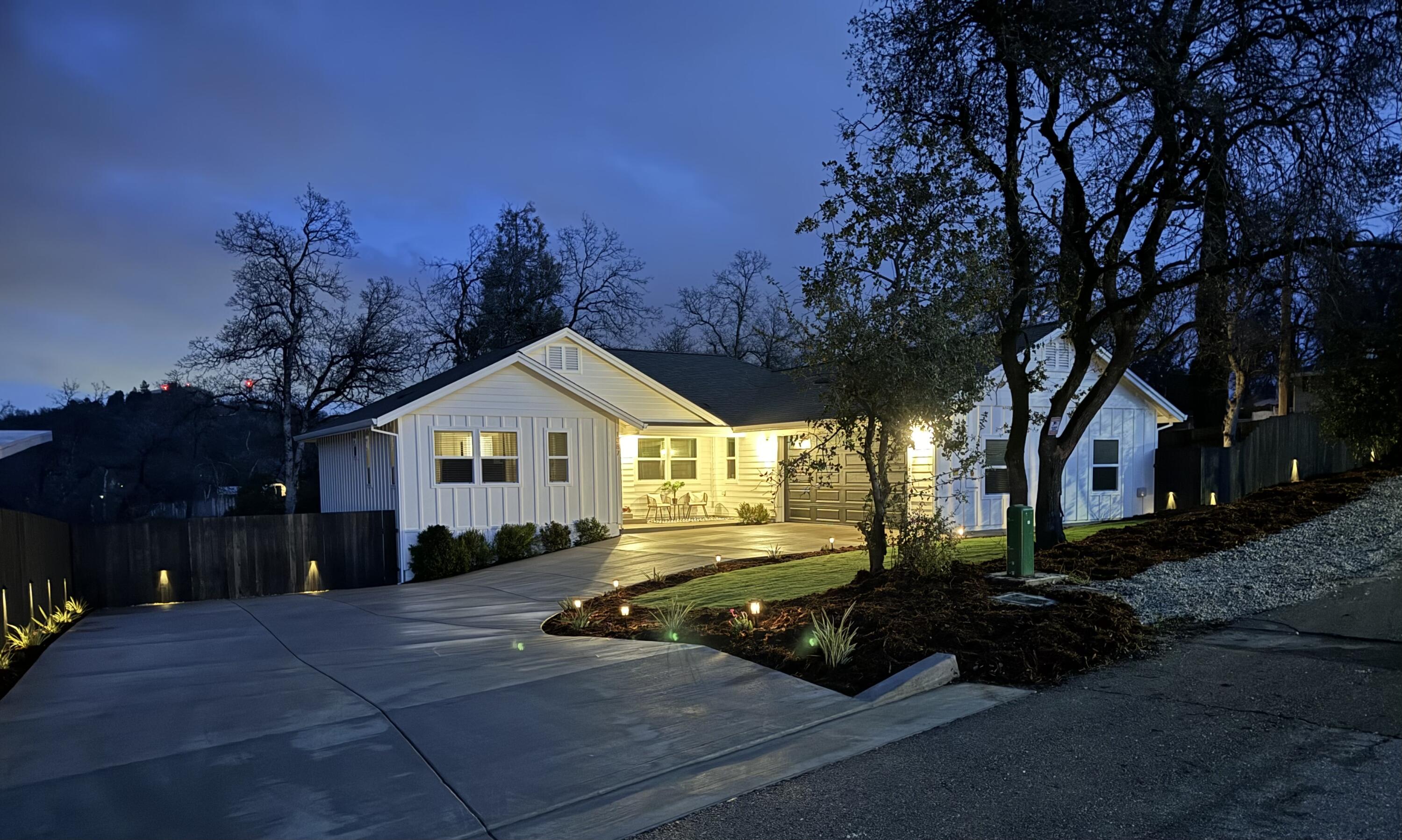 1387 Ridge Drive Redding, CA 96001 - Photo 42 of 44 a view of house with yard and green space