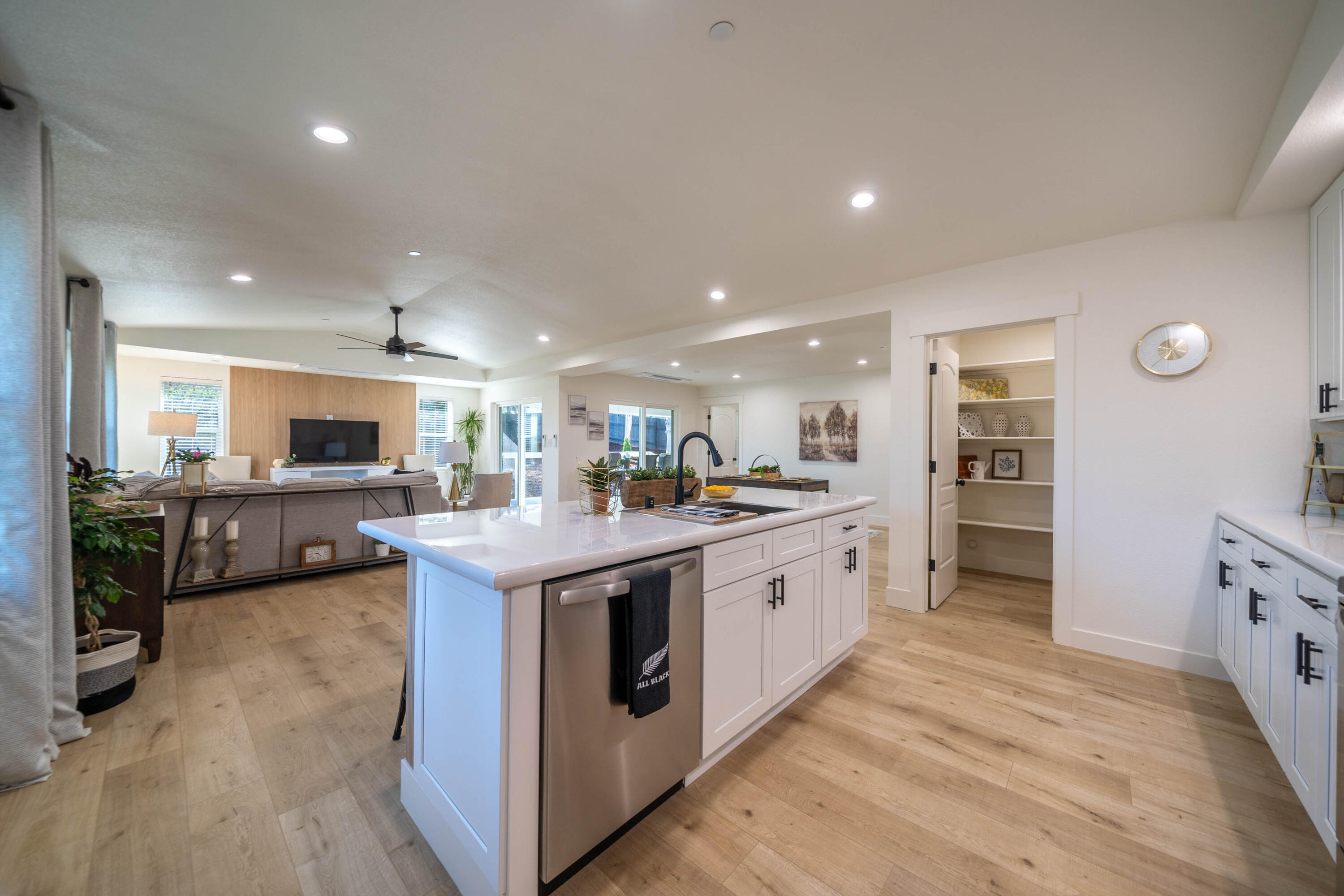 1387 Ridge Drive Redding, CA 96001 - Photo 8 of 44 a large kitchen with stainless steel appliances granite countertop a stove and a sink