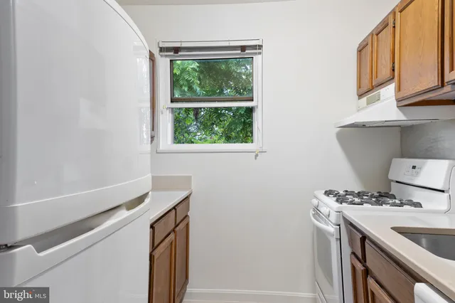 a utility room with washer and dryer
