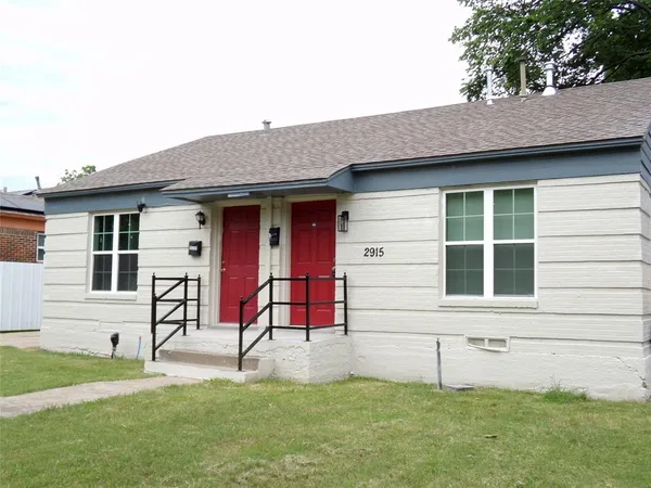 a house that has a garden in front of it