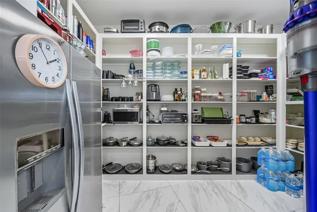 a kitchen with stainless steel appliances granite countertop a sink and stove