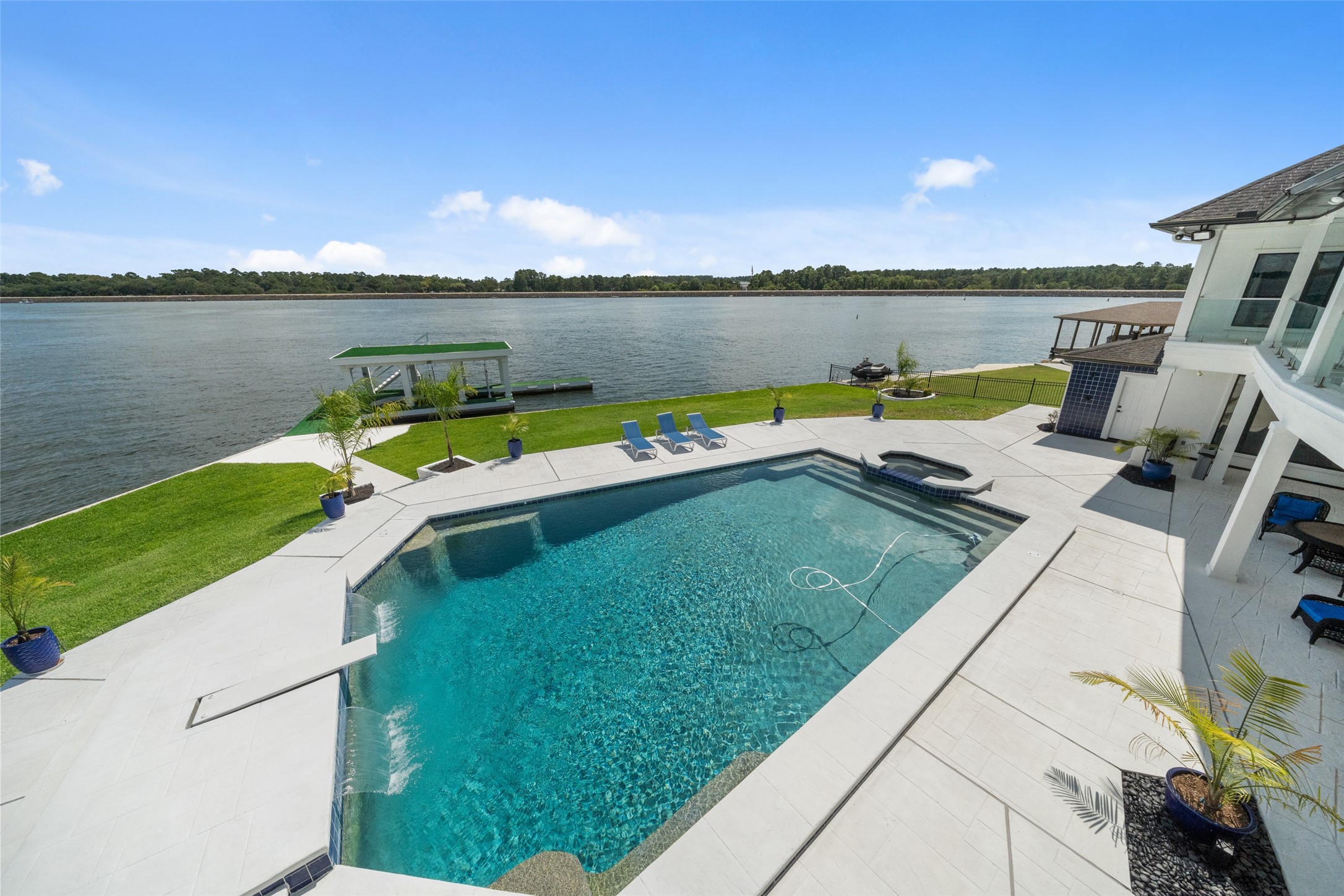 2500 Sand Shore Drive Conroe, TX 77304 - Photo 44 of 50 a view of a lake with couches chairs