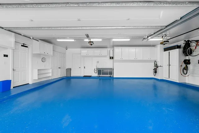 an aerial view of a house with a lake view