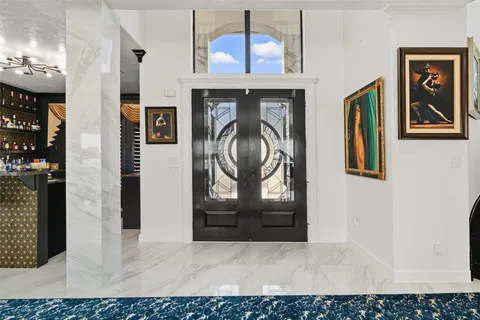 a view of front door with hallway