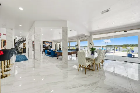 a view of a street with benches in the background