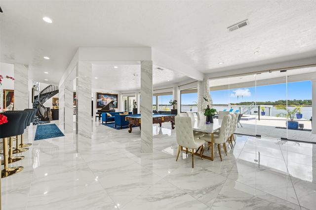 a view of a street with benches in the background