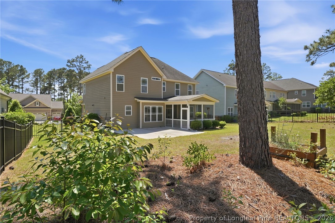 886 Micahs Way North Spring Lake, NC 28390 - Photo 40 of 50 a front view of a house with a yard