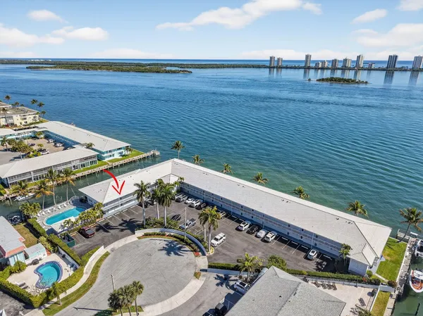 an aerial view of a resort with a big yard