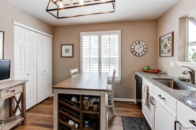 a kitchen with stainless steel appliances a refrigerator stove microwave and sink