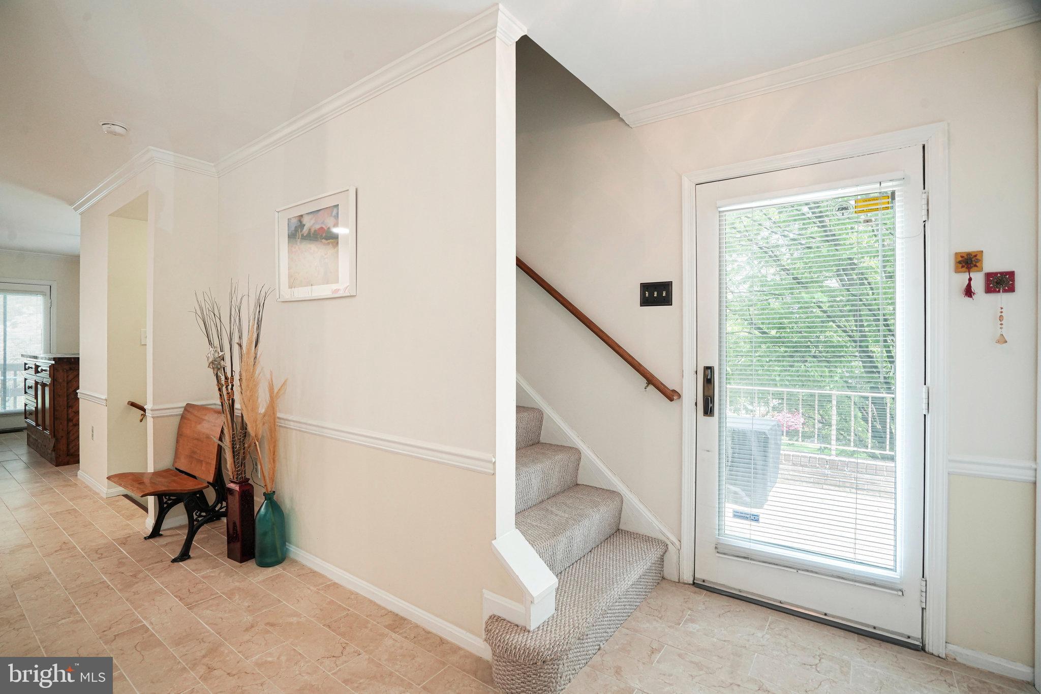 8872 Woodland Drive Silver Spring, MD 20910 - Photo 16 of 47 a view of entryway with livingroom and furniture