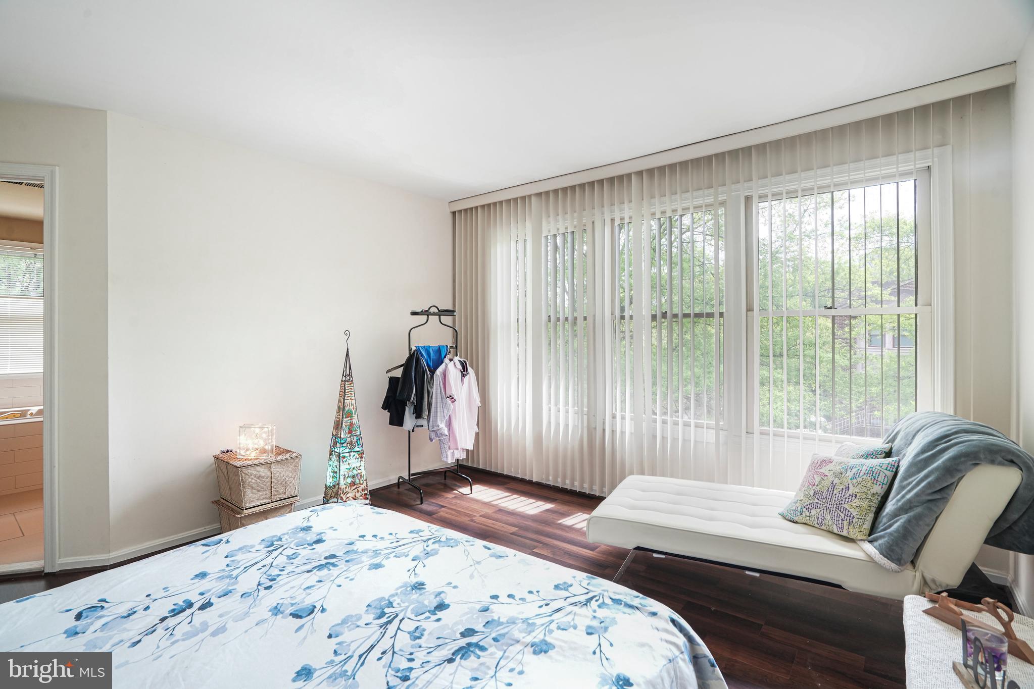 8872 Woodland Drive Silver Spring, MD 20910 - Photo 18 of 47 a bedroom with a bed and a window