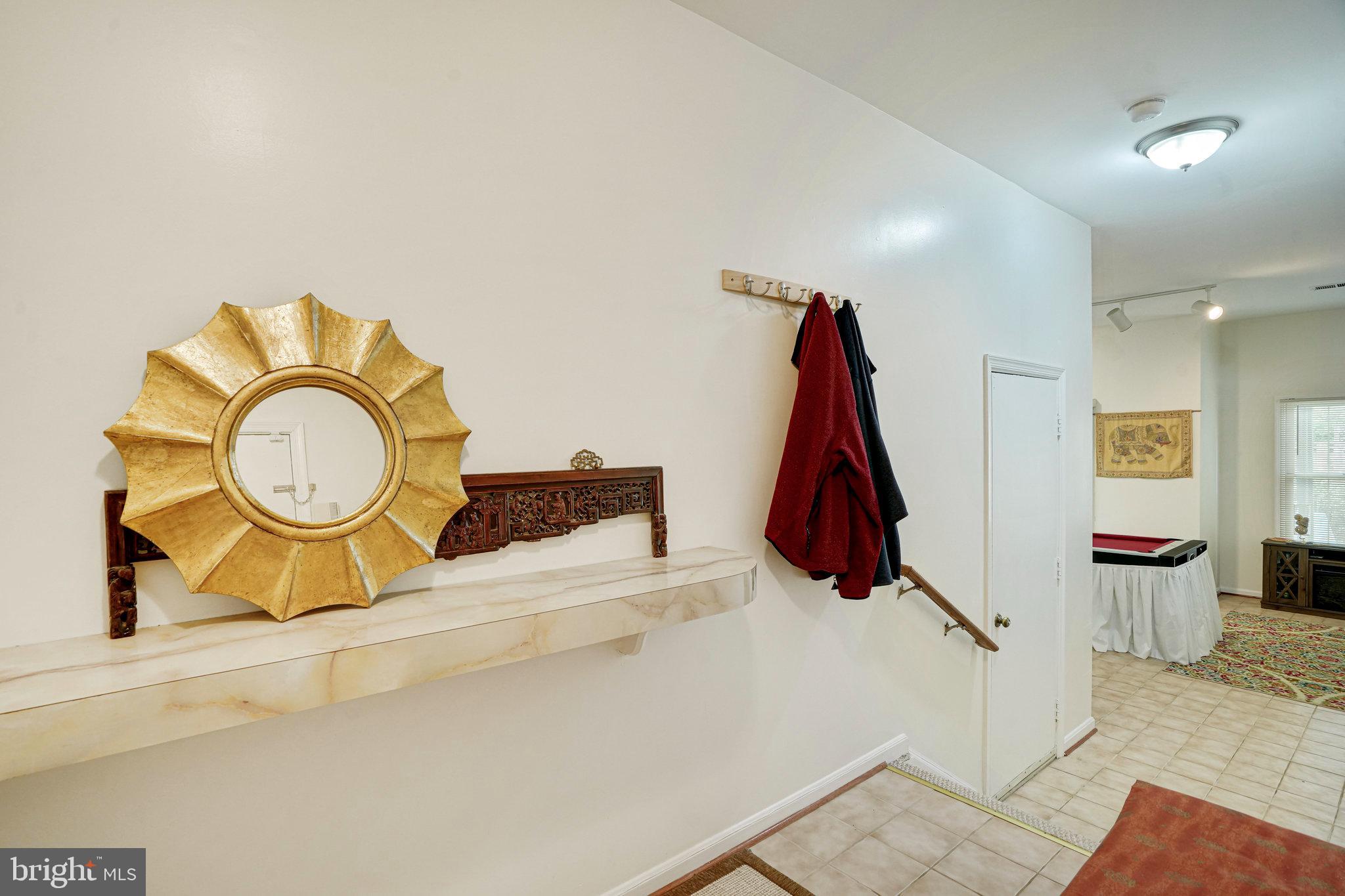 8872 Woodland Drive Silver Spring, MD 20910 - Photo 28 of 47 a view of a room with furniture and wooden floors