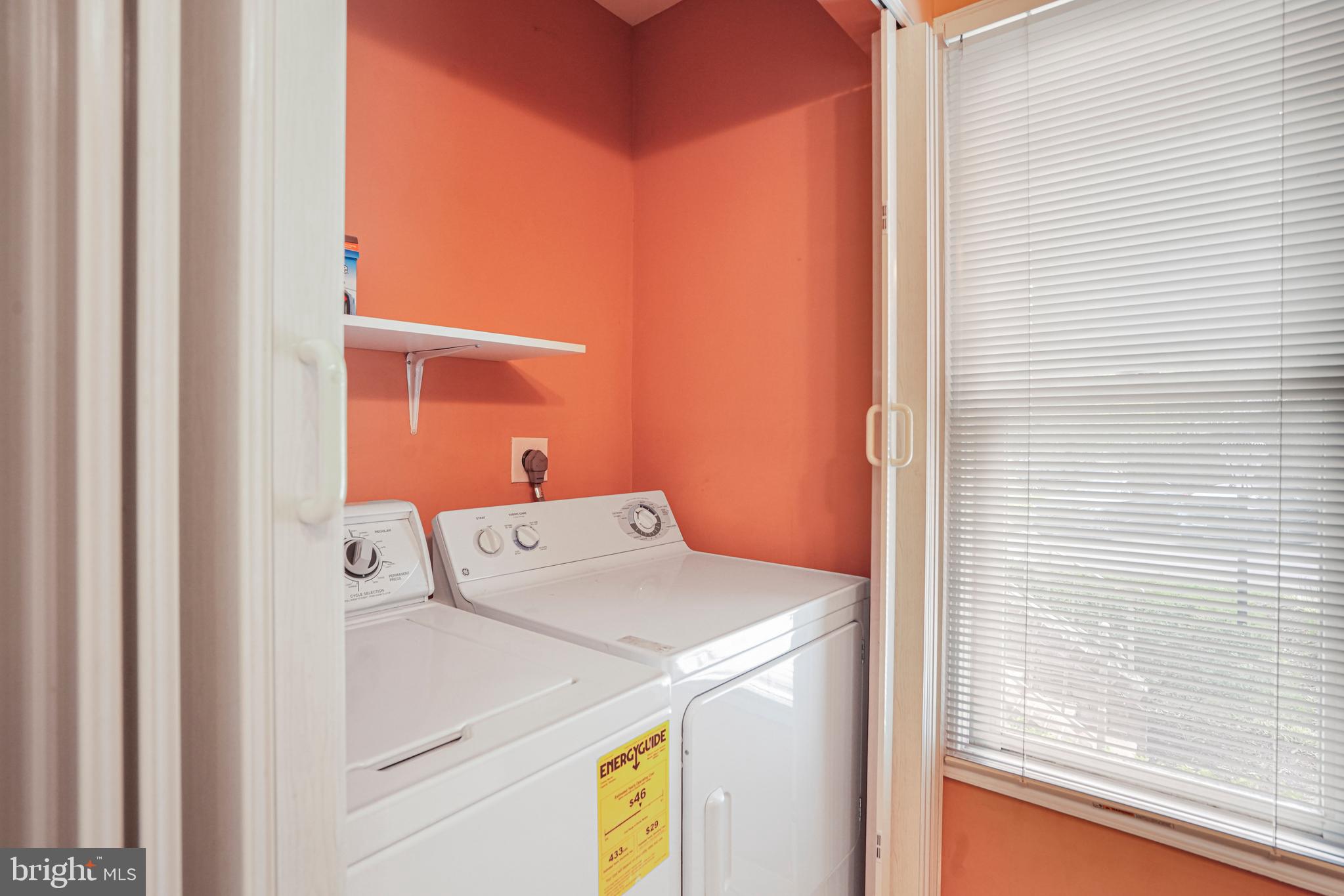 8872 Woodland Drive Silver Spring, MD 20910 - Photo 32 of 47 a utility room with dryer and washer