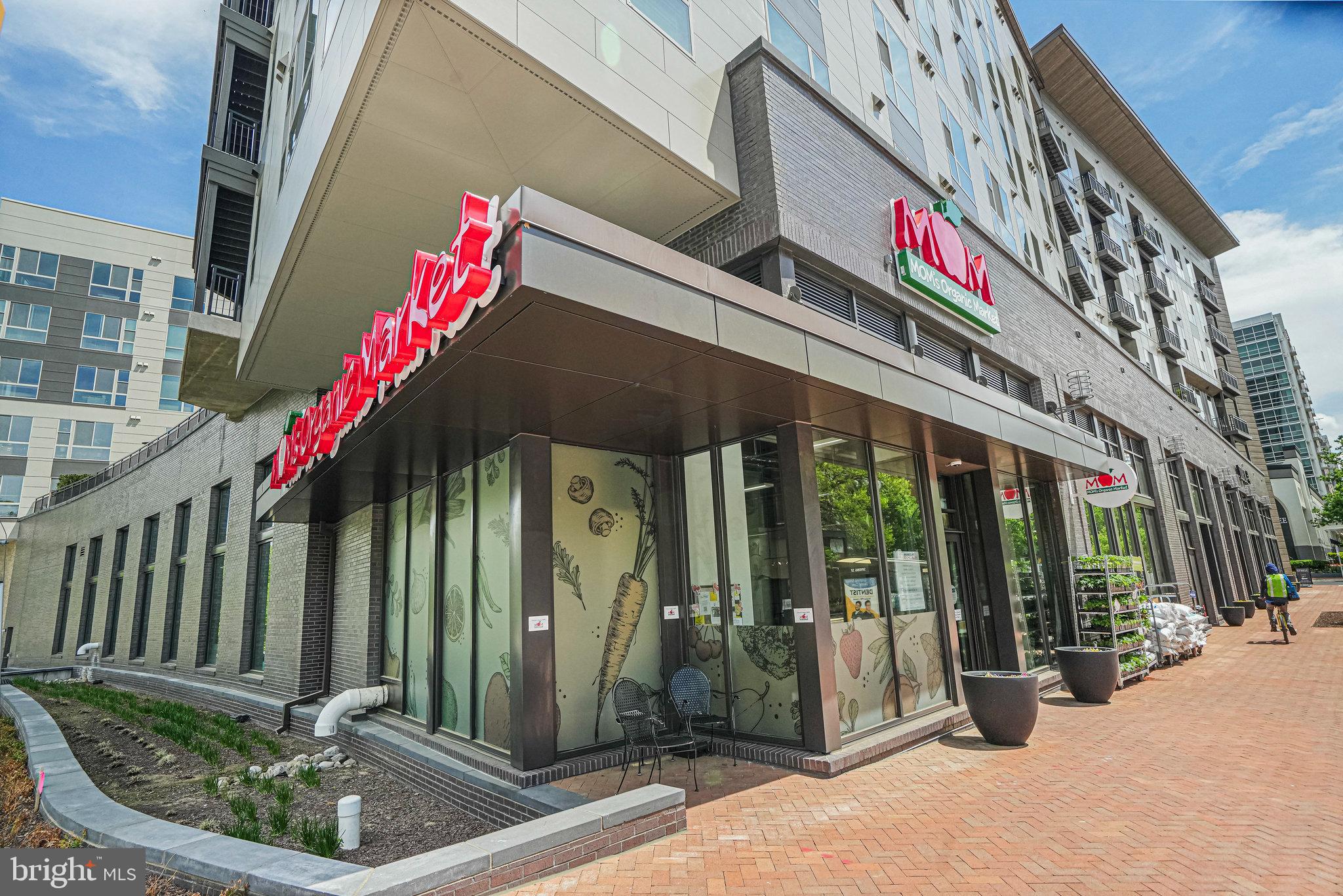 8872 Woodland Drive Silver Spring, MD 20910 - Photo 39 of 47 a front view of multi story residential apartment building with entryway