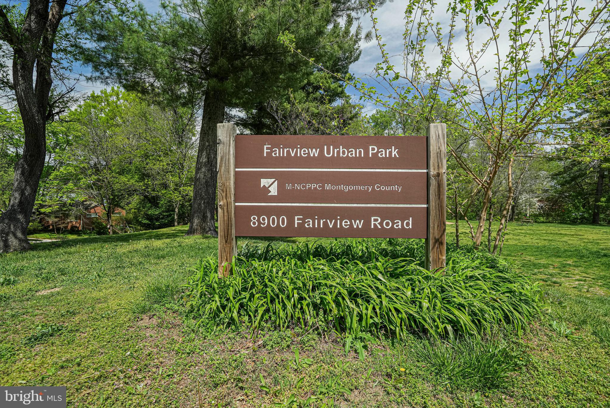 8872 Woodland Drive Silver Spring, MD 20910 - Photo 43 of 47 a sign on the side of the tree