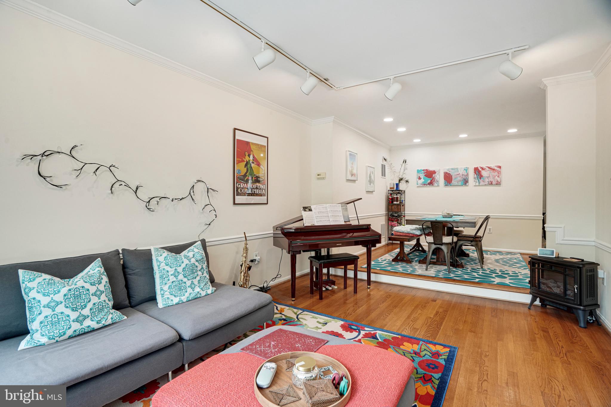 8872 Woodland Drive Silver Spring, MD 20910 - Photo 7 of 47 a living room with furniture and wooden floor