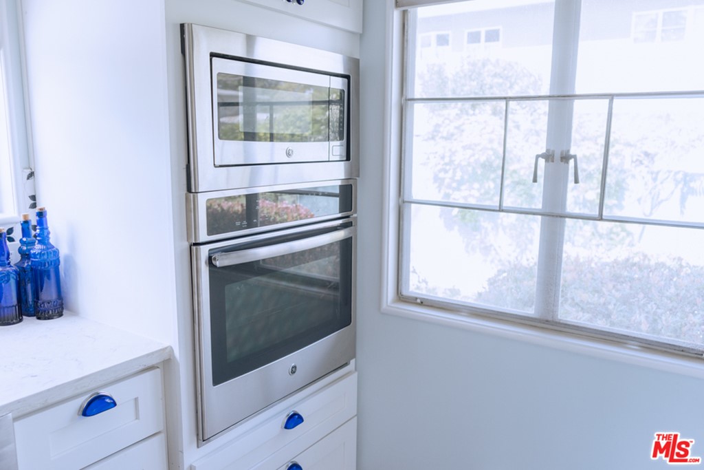 5478 Village Los Angeles, CA 90016 - Photo 12 of 31 a view of wooden floor and cabinets