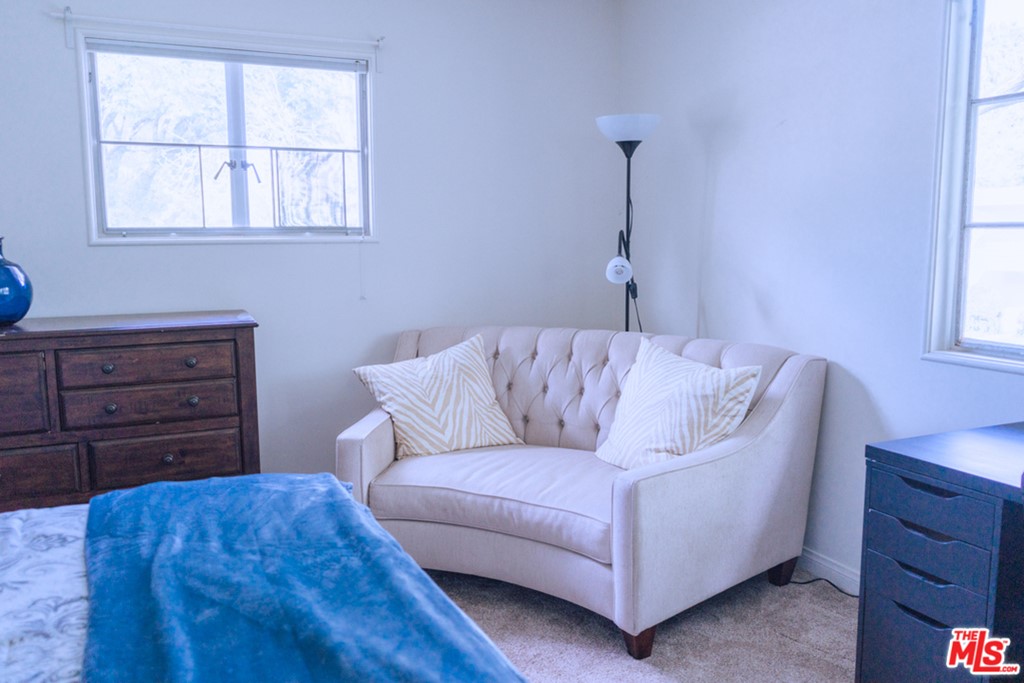 5478 Village Los Angeles, CA 90016 - Photo 22 of 31 a living room with furniture and a window
