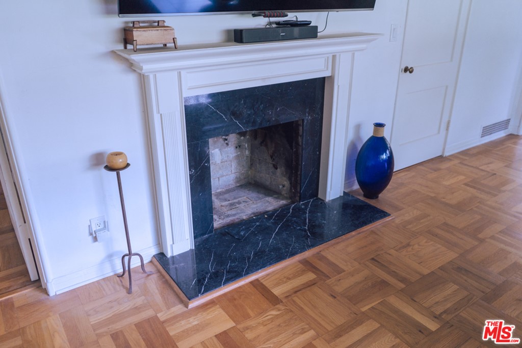 5478 Village Los Angeles, CA 90016 - Photo 6 of 31 a view of a livingroom with a fireplace