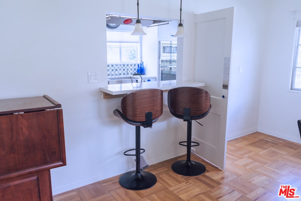 5478 Village Los Angeles, CA 90016 - Photo 7 of 31 a bathroom with a sink and a mirror