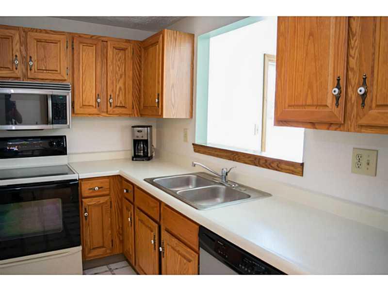187 Rocky Ridge Road Bethel Park, PA 15102 - Photo 11 of 25 Kitchen. Pass through window lets in natural light from sun room