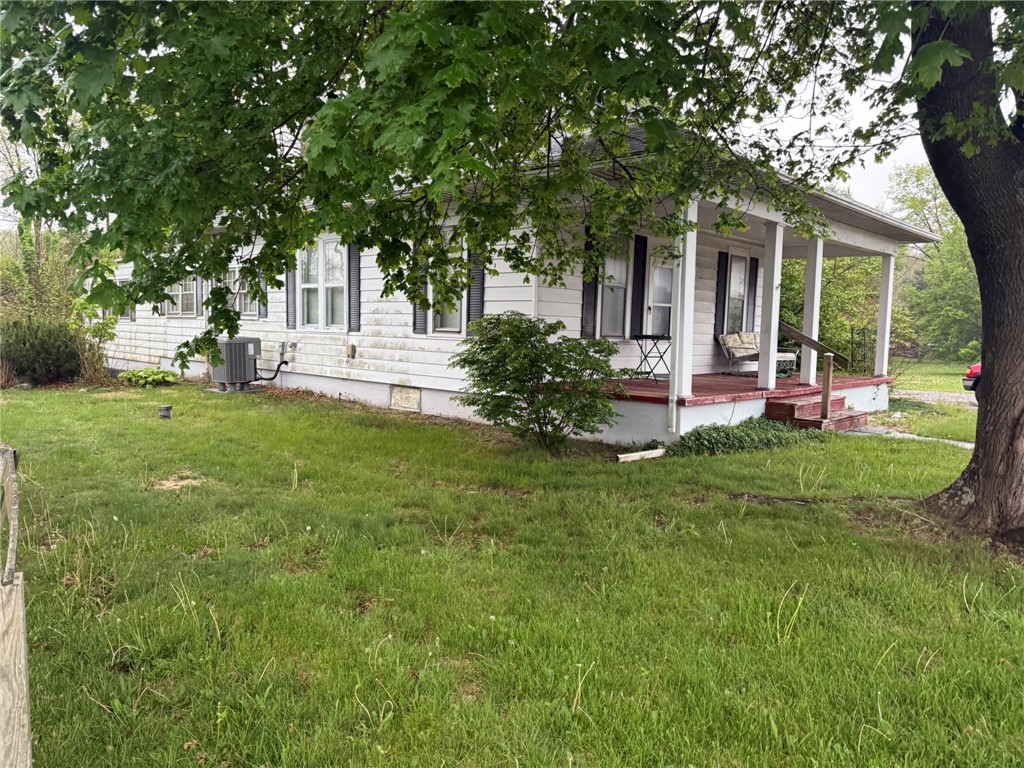 121 State Route, Unit 10570 New Paris, OH 45347 - Photo 2 of 8 This charming home offers a welcoming porch, perfect for enjoying peaceful outdoor moments.