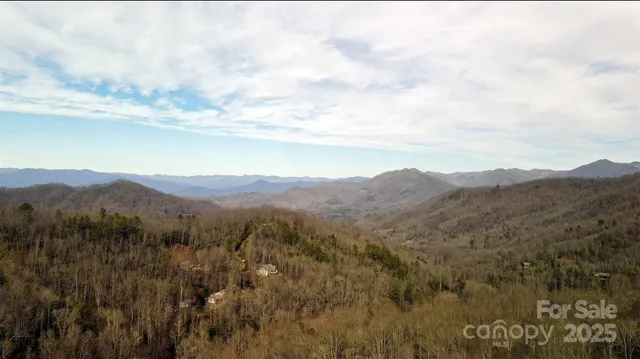 a view of mountains and valleys