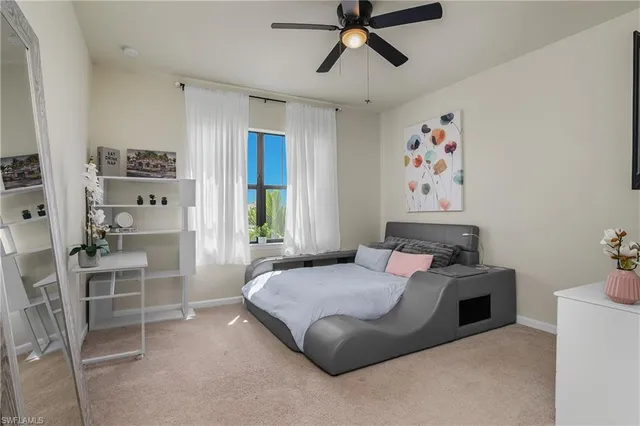 a bedroom with a bed and furniture