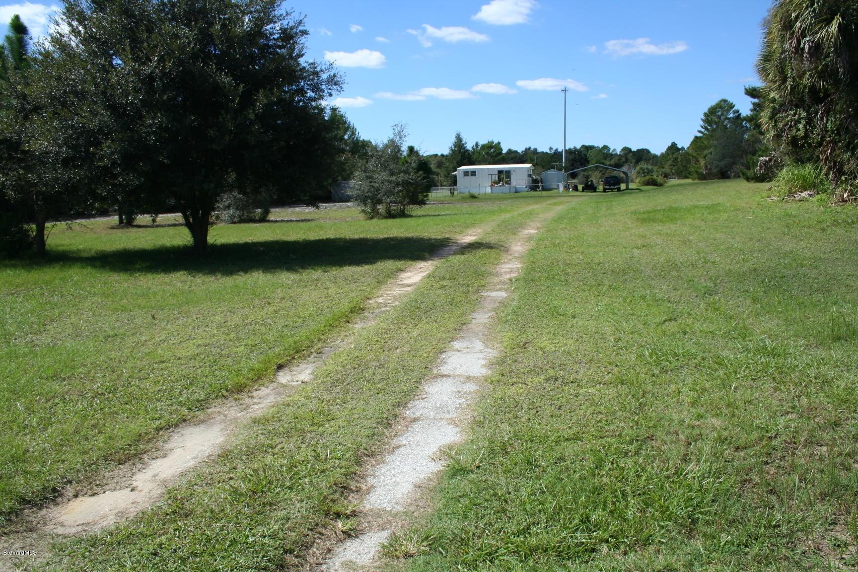 5020 Blounts Ridge Road Mims, FL 32754 - Photo 4 of 7 IMG_1236
