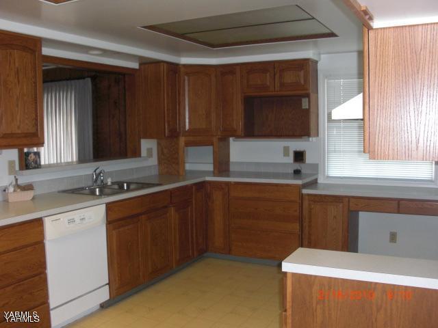 2221 Thacker Road Zillah, WA 98953 - Photo 2 of 7 a kitchen with a sink and a stove top oven