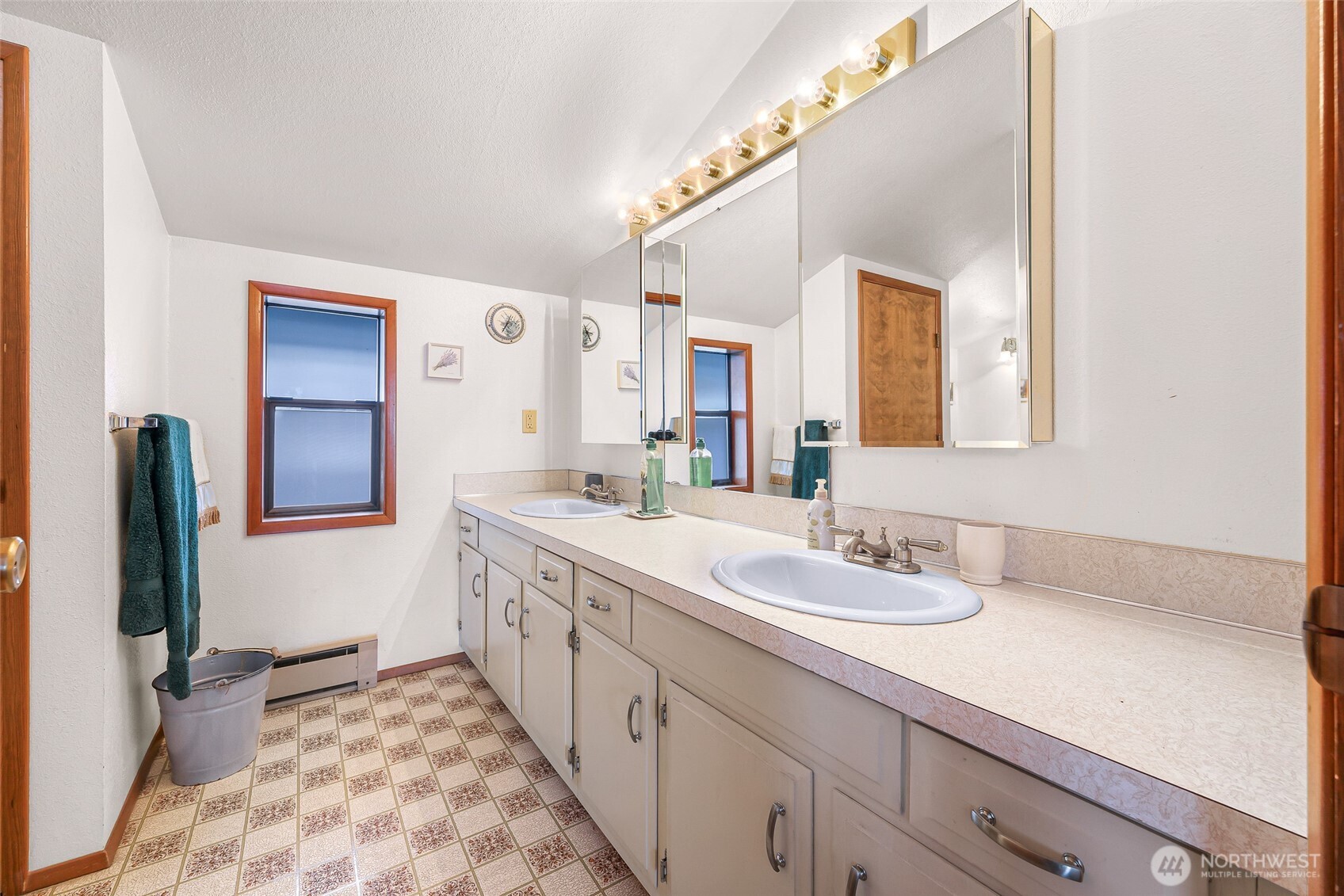 4877 Maple Lane Ferndale, WA 98248 - Photo 14 of 35 a spacious bathroom with a double vanity sink and mirror