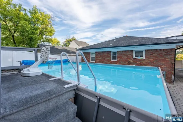 a view of a house with backyard
