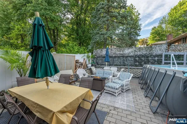 a view of an outdoor space with furniture