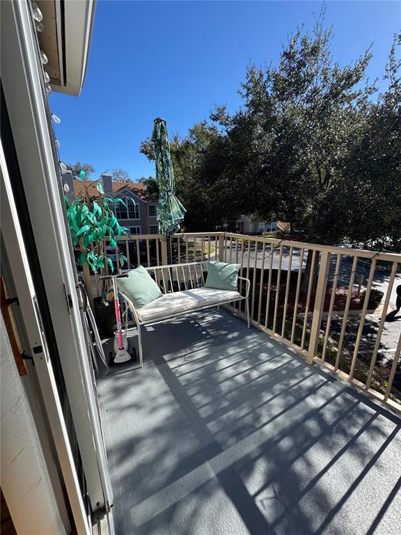 655 Magic Court, Unit 188 Altamonte Springs, FL 32714 - Photo 16 of 33 a view of a balcony with furniture
